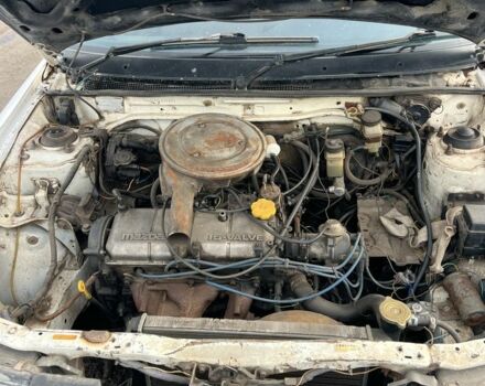 Белый Мазда 323, объемом двигателя 0 л и пробегом 1 тыс. км за 638 $, фото 1 на Automoto.ua