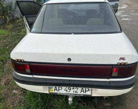 Белый Мазда 323, объемом двигателя 0 л и пробегом 1 тыс. км за 638 $, фото 4 на Automoto.ua