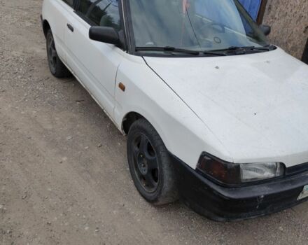 Белый Мазда 323, объемом двигателя 0 л и пробегом 480 тыс. км за 500 $, фото 2 на Automoto.ua