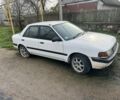 Белый Мазда 323, объемом двигателя 0 л и пробегом 1 тыс. км за 638 $, фото 1 на Automoto.ua
