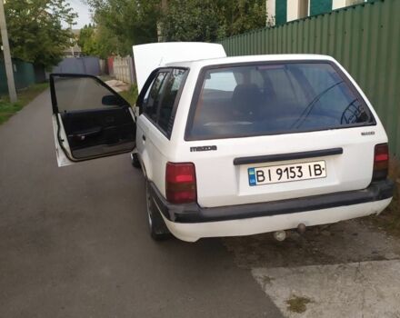 Білий Мазда 323, об'ємом двигуна 1.5 л та пробігом 20 тис. км за 1187 $, фото 1 на Automoto.ua