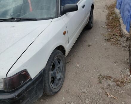 Белый Мазда 323, объемом двигателя 0 л и пробегом 480 тыс. км за 500 $, фото 1 на Automoto.ua