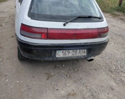 Белый Мазда 323, объемом двигателя 0 л и пробегом 480 тыс. км за 500 $, фото 3 на Automoto.ua