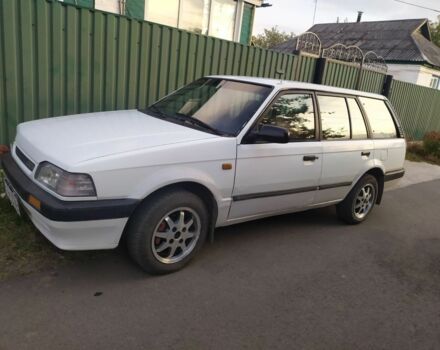 Білий Мазда 323, об'ємом двигуна 1.5 л та пробігом 20 тис. км за 1187 $, фото 2 на Automoto.ua