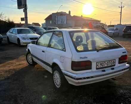 Білий Мазда 323, об'ємом двигуна 15 л та пробігом 300 тис. км за 750 $, фото 3 на Automoto.ua