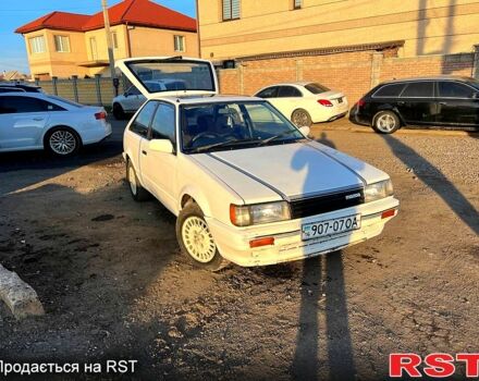 Білий Мазда 323, об'ємом двигуна 15 л та пробігом 300 тис. км за 750 $, фото 1 на Automoto.ua