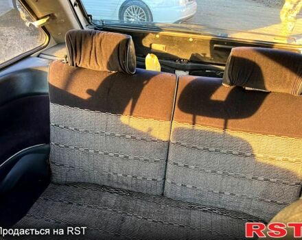 Білий Мазда 323, об'ємом двигуна 15 л та пробігом 300 тис. км за 750 $, фото 7 на Automoto.ua