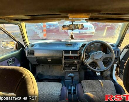 Білий Мазда 323, об'ємом двигуна 15 л та пробігом 300 тис. км за 750 $, фото 6 на Automoto.ua