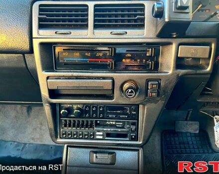 Білий Мазда 323, об'ємом двигуна 15 л та пробігом 300 тис. км за 750 $, фото 8 на Automoto.ua