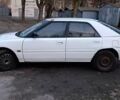 Белый Мазда 323, объемом двигателя 1.6 л и пробегом 469 тыс. км за 1500 $, фото 1 на Automoto.ua