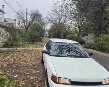 Белый Мазда 323, объемом двигателя 1.6 л и пробегом 298 тыс. км за 1300 $, фото 1 на Automoto.ua