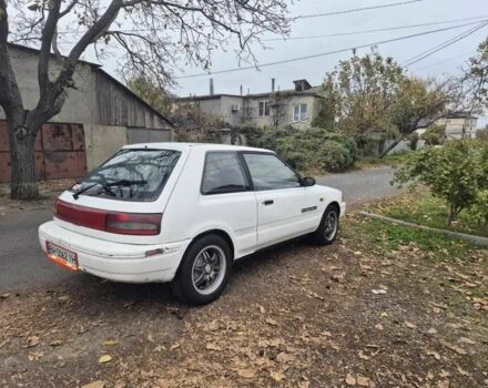 Белый Мазда 323, объемом двигателя 1.6 л и пробегом 298 тыс. км за 1300 $, фото 3 на Automoto.ua