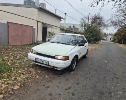 Белый Мазда 323, объемом двигателя 1.6 л и пробегом 298 тыс. км за 1300 $, фото 2 на Automoto.ua