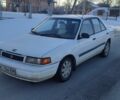 Білий Мазда 323, об'ємом двигуна 1.8 л та пробігом 300 тис. км за 600 $, фото 1 на Automoto.ua