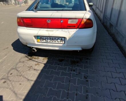 Білий Мазда 323, об'ємом двигуна 1.5 л та пробігом 250 тис. км за 1600 $, фото 4 на Automoto.ua