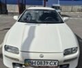 Белый Мазда 323, объемом двигателя 2 л и пробегом 430 тыс. км за 2500 $, фото 1 на Automoto.ua