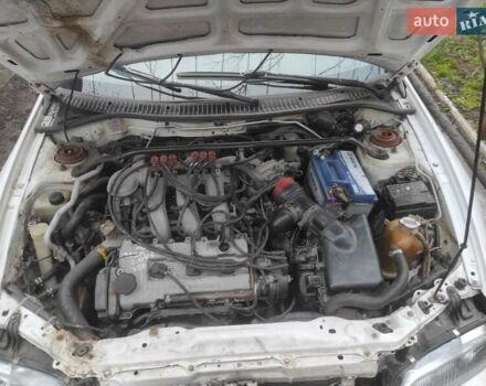Белый Мазда 323, объемом двигателя 2 л и пробегом 300 тыс. км за 2300 $, фото 4 на Automoto.ua