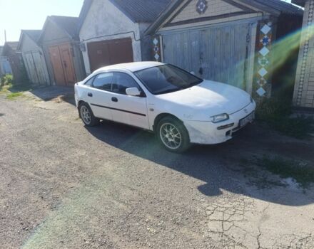 Белый Мазда 323, объемом двигателя 1.5 л и пробегом 380 тыс. км за 1550 $, фото 4 на Automoto.ua