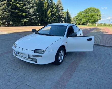 Белый Мазда 323, объемом двигателя 1.5 л и пробегом 445 тыс. км за 3300 $, фото 2 на Automoto.ua