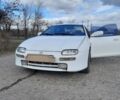 Білий Мазда 323, об'ємом двигуна 2 л та пробігом 300 тис. км за 2300 $, фото 3 на Automoto.ua