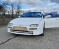 Білий Мазда 323, об'ємом двигуна 2 л та пробігом 300 тис. км за 2300 $, фото 3 на Automoto.ua