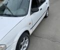 Белый Мазда 323, объемом двигателя 0 л и пробегом 400 тыс. км за 1106 $, фото 3 на Automoto.ua