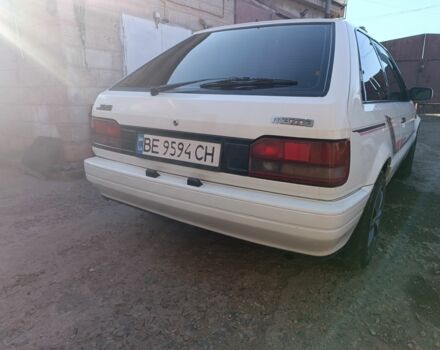 Белый Мазда 323, объемом двигателя 1.6 л и пробегом 200 тыс. км за 1350 $, фото 3 на Automoto.ua