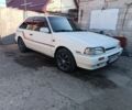 Белый Мазда 323, объемом двигателя 1.6 л и пробегом 200 тыс. км за 1350 $, фото 1 на Automoto.ua