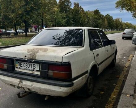 Белый Мазда 323, объемом двигателя 1.8 л и пробегом 2 тыс. км за 476 $, фото 1 на Automoto.ua