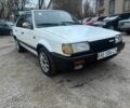 Белый Мазда 323, объемом двигателя 1.6 л и пробегом 200 тыс. км за 760 $, фото 1 на Automoto.ua