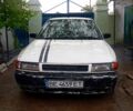 Білий Мазда 323, об'ємом двигуна 1.5 л та пробігом 0 тис. км за 700 $, фото 1 на Automoto.ua