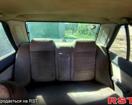 Білий Мазда 323, об'ємом двигуна 1.3 л та пробігом 380 тис. км за 720 $, фото 1 на Automoto.ua