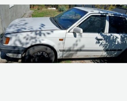 Белый Мазда 323, объемом двигателя 1 л и пробегом 324 тыс. км за 831 $, фото 8 на Automoto.ua