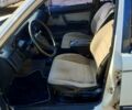 Белый Мазда 323, объемом двигателя 1.3 л и пробегом 389 тыс. км за 700 $, фото 2 на Automoto.ua