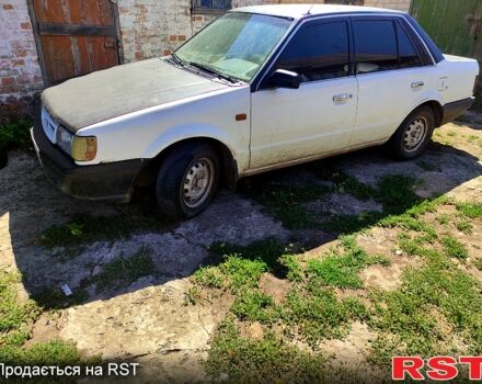 Білий Мазда 323, об'ємом двигуна 1.3 л та пробігом 380 тис. км за 720 $, фото 7 на Automoto.ua