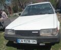 Белый Мазда 323, объемом двигателя 1.3 л и пробегом 350 тыс. км за 457 $, фото 1 на Automoto.ua