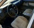 Белый Мазда 323, объемом двигателя 1.3 л и пробегом 389 тыс. км за 700 $, фото 1 на Automoto.ua