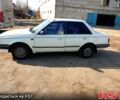 Белый Мазда 323, объемом двигателя 1.3 л и пробегом 389 тыс. км за 700 $, фото 5 на Automoto.ua