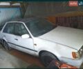 Белый Мазда 323, объемом двигателя 1.3 л и пробегом 100 тыс. км за 400 $, фото 1 на Automoto.ua