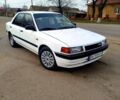 Білий Мазда 323, об'ємом двигуна 1.8 л та пробігом 88 тис. км за 1500 $, фото 1 на Automoto.ua