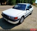 Білий Мазда 323, об'ємом двигуна 1.8 л та пробігом 89 тис. км за 1550 $, фото 1 на Automoto.ua