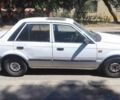 Белый Мазда 323, объемом двигателя 1.3 л и пробегом 888 тыс. км за 800 $, фото 7 на Automoto.ua