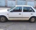 Белый Мазда 323, объемом двигателя 1.3 л и пробегом 888 тыс. км за 800 $, фото 4 на Automoto.ua