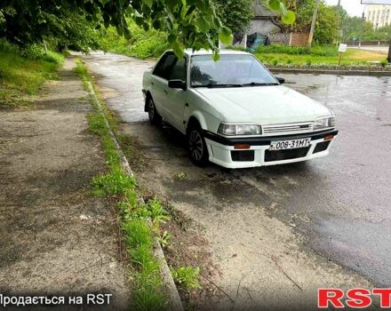 Белый Мазда 323, объемом двигателя 1.5 л и пробегом 326 тыс. км за 700 $, фото 2 на Automoto.ua