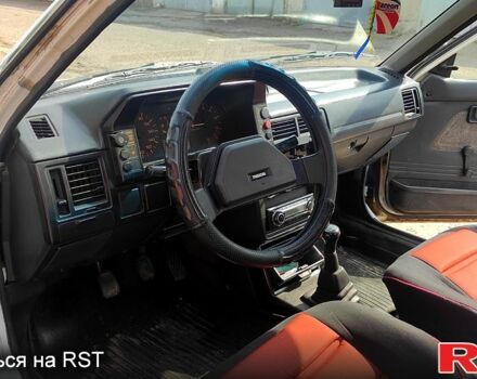 Белый Мазда 323, объемом двигателя 1.3 л и пробегом 888 тыс. км за 800 $, фото 3 на Automoto.ua