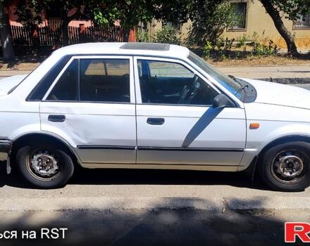 Белый Мазда 323, объемом двигателя 1.3 л и пробегом 888 тыс. км за 800 $, фото 5 на Automoto.ua