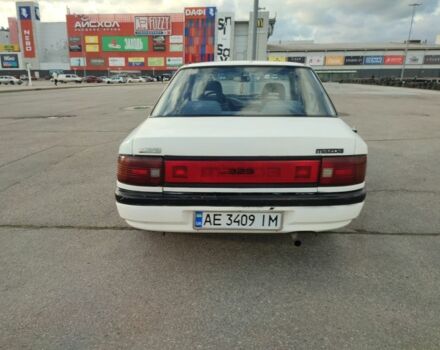 Белый Мазда 323, объемом двигателя 1.5 л и пробегом 315 тыс. км за 1400 $, фото 3 на Automoto.ua