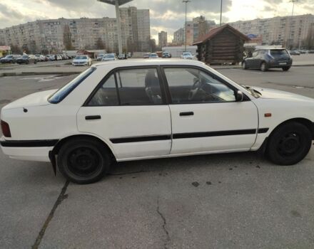 Белый Мазда 323, объемом двигателя 1.5 л и пробегом 315 тыс. км за 1400 $, фото 5 на Automoto.ua