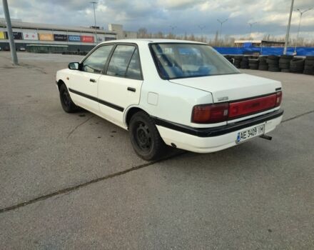 Белый Мазда 323, объемом двигателя 1.5 л и пробегом 315 тыс. км за 1400 $, фото 2 на Automoto.ua