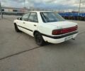 Белый Мазда 323, объемом двигателя 1.5 л и пробегом 315 тыс. км за 1400 $, фото 2 на Automoto.ua
